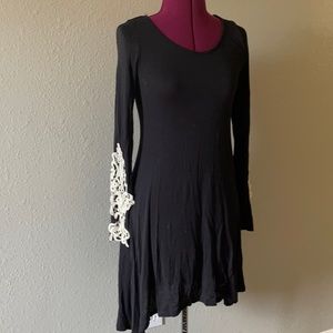 Black knit dress with lace crochet sleeves
